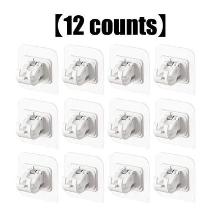12 transparent curtain rod brackets laid out in a grid showing the full set